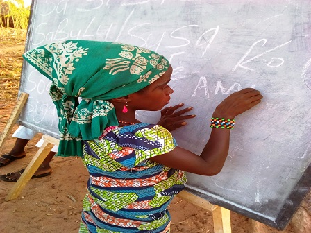 A girl who had never been to school, writing her name after few weeks in the non formal learning center in ciromari community of Misau LGA